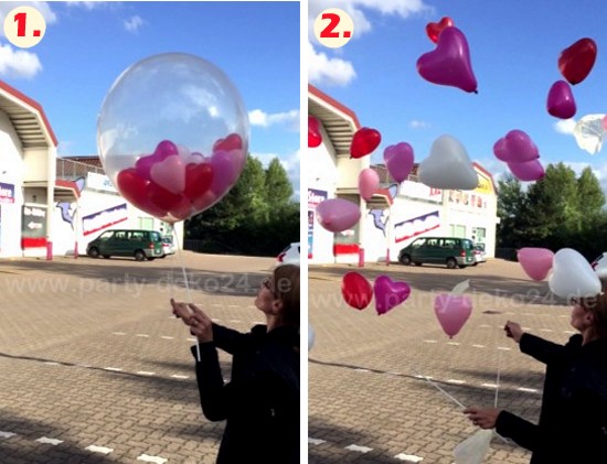 Ballonexplosion: Explodierender Helium Ballon mit kleinen Ballons
