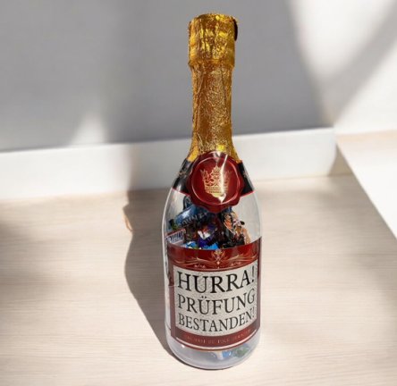 Sektflasche gefüllt - Prüfung bestanden